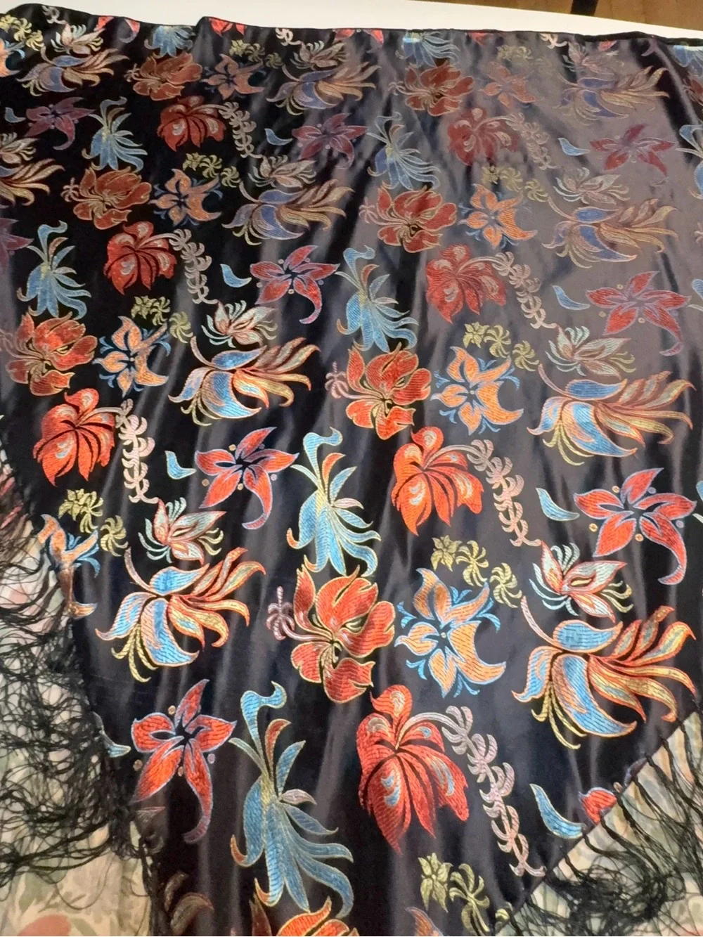 black floral embroidered silk like boho shawl featuring long fringe trim